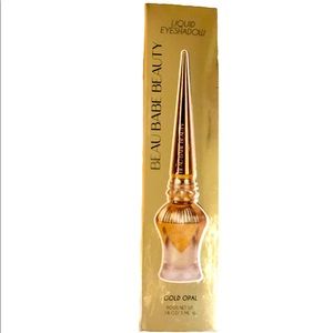 Gold opal liquid eyeshadow by Beau Babe Beauty.